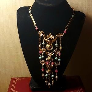 Unsigned Goldette goldtone 3 tier necklace with multicolor beads.